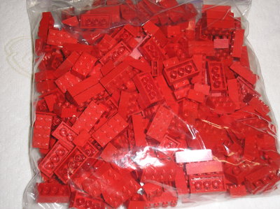 assorted red pieces in bag